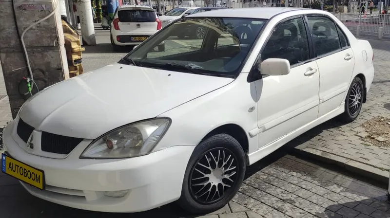 Mitsubishi Lancer с пробегом, 2009