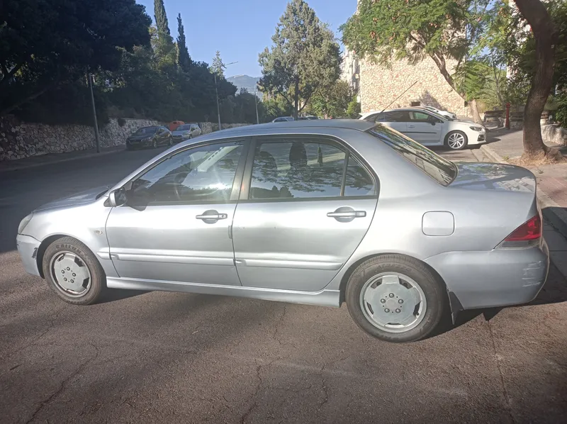 Mitsubishi Lancer с пробегом, 2006, частная рука