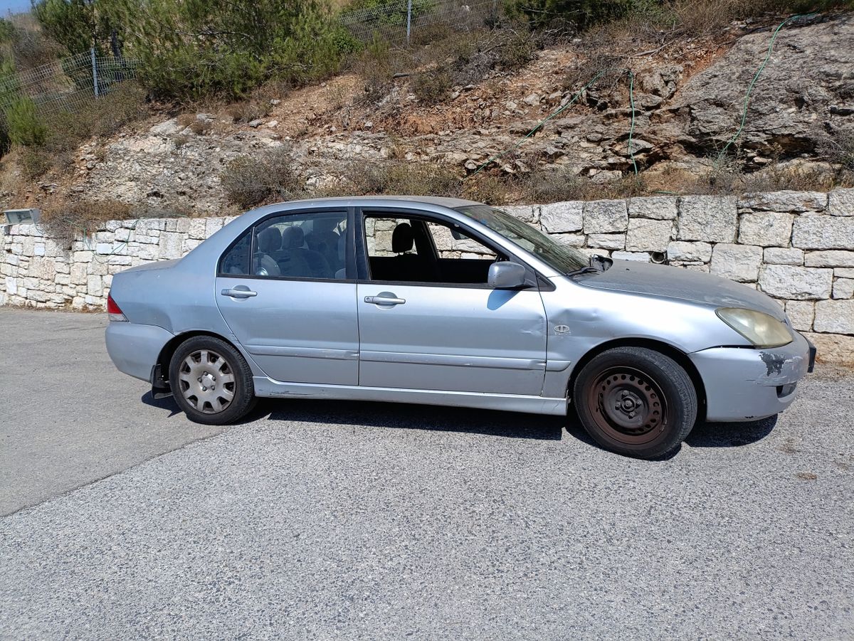 Mitsubishi Lancer с пробегом, 2008