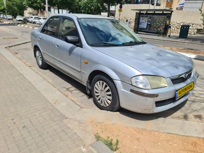 Mazda 323 Lantis 2ème main, 2001, main privée