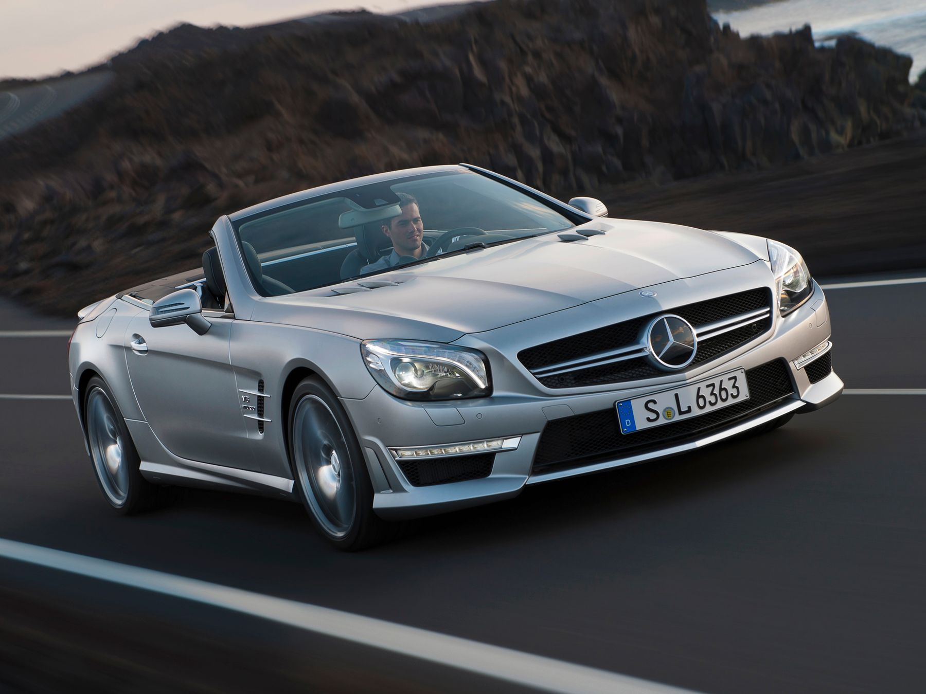 Как выглядит машина в германии Mercedes SL-Class AMG roadster SL AMG 63 5.5 AT gasoline 585 hp rwd type of driv