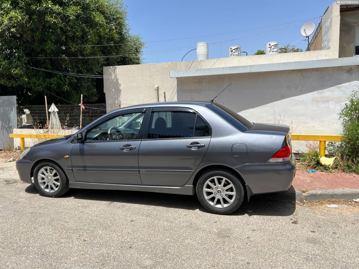 Mitsubishi Lancer с пробегом, 2009, частная