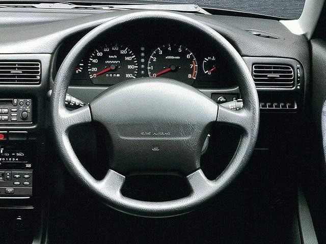Mazda Familia 1994. Dashboard. Estate 5-door, 8 generation