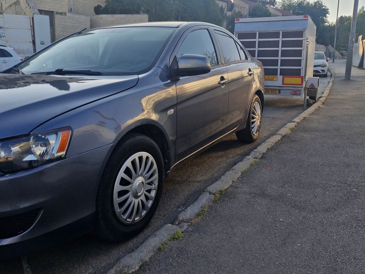 Mitsubishi Lancer с пробегом, 2009, частная рука