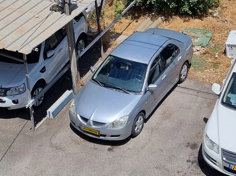 מיצובישי לנסר יד 2 רכב, 2005, פרטי