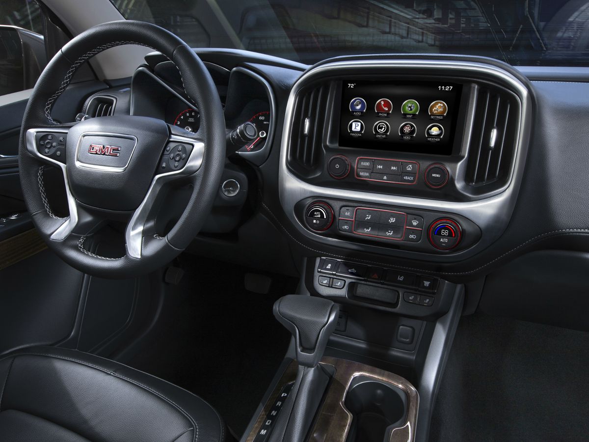 GMC Canyon 2014. Console centrale. 2 pick-up, 2 génération