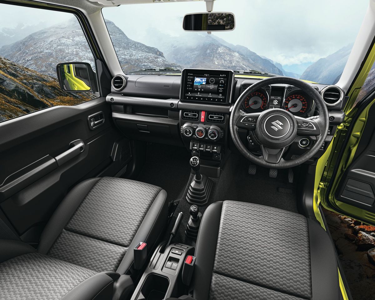 Suzuki Jimny 2023. Front seats. SUV 5-doors, 4 generation