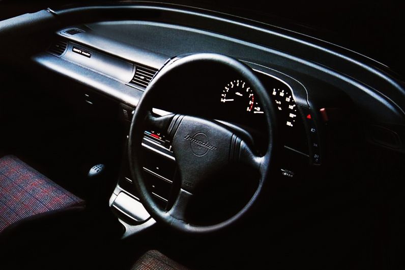 Isuzu Gemini 1990. Dashboard. Sedan, 3 generation