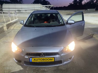 Mitsubishi Lancer с пробегом, 2010, частная рука