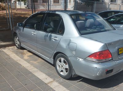 מיצובישי לנסר יד 2 רכב, 2005, פרטי