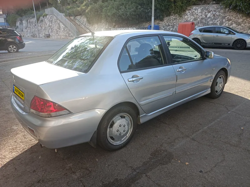 Mitsubishi Lancer с пробегом, 2006, частная рука