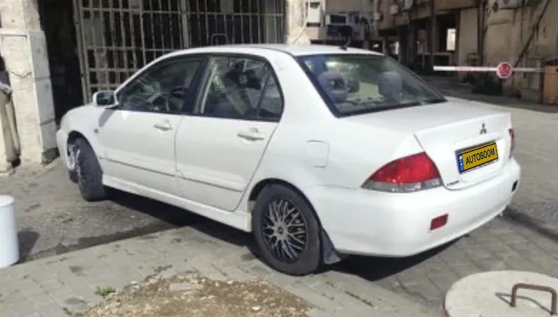 Mitsubishi Lancer с пробегом, 2009