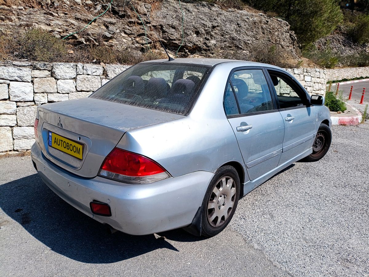 Mitsubishi Lancer с пробегом, 2008