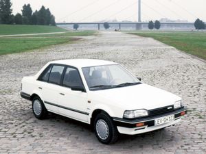 Mazda 323 Lantis 1985. Carrosserie, extérieur. Berline, 3 génération