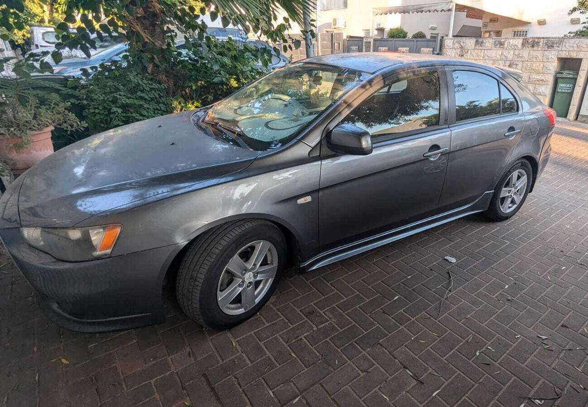Mitsubishi Lancer с пробегом, 2010, частная рука