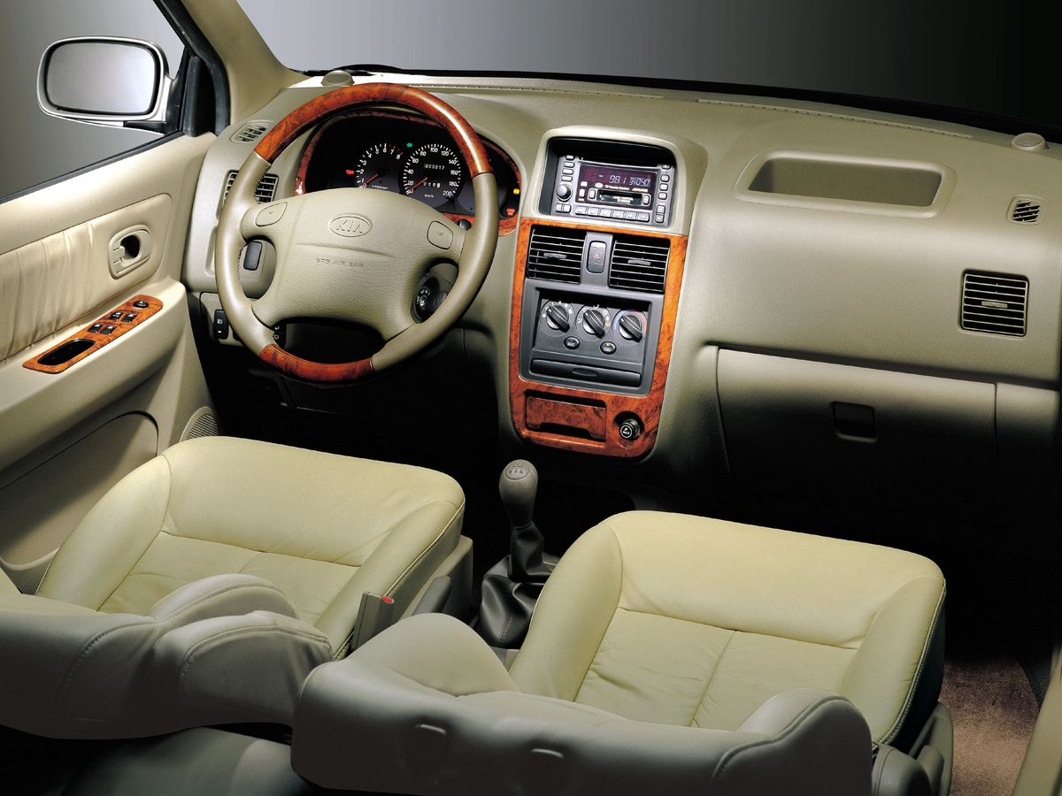 Kia Carens 1999. Front seats. Compact Van, 1 generation