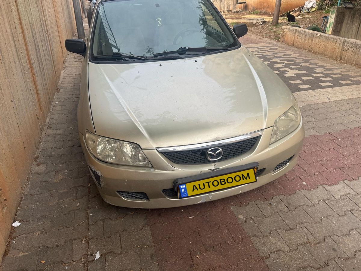 Mazda 323 Lantis 2ème main, 2004, main privée