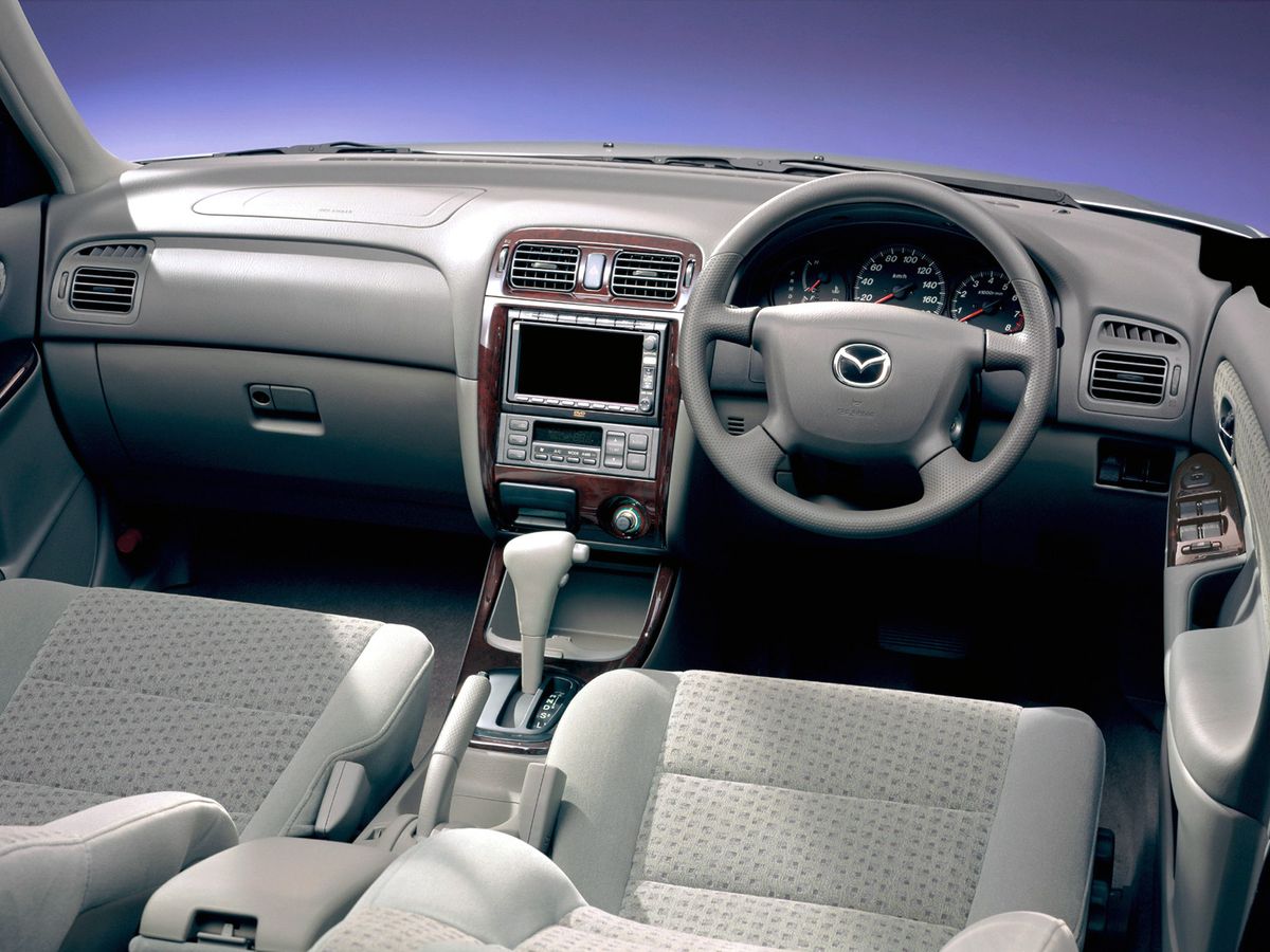 Mazda Capella 1997. Front seats. Sedan, 6 generation