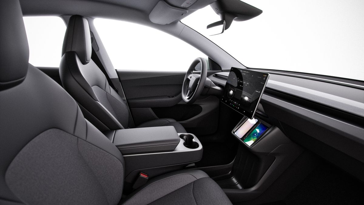 Tesla Model Y 2025. Передние сидения. Внедорожник 5 дв., 1 поколение, рестайлинг