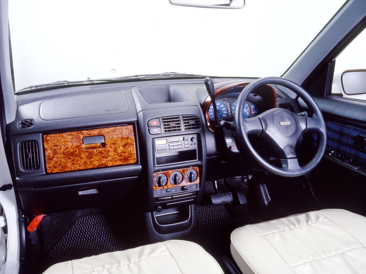 Mitsuoka Yuga 2000. Front seats. Compact Van, 1 generation