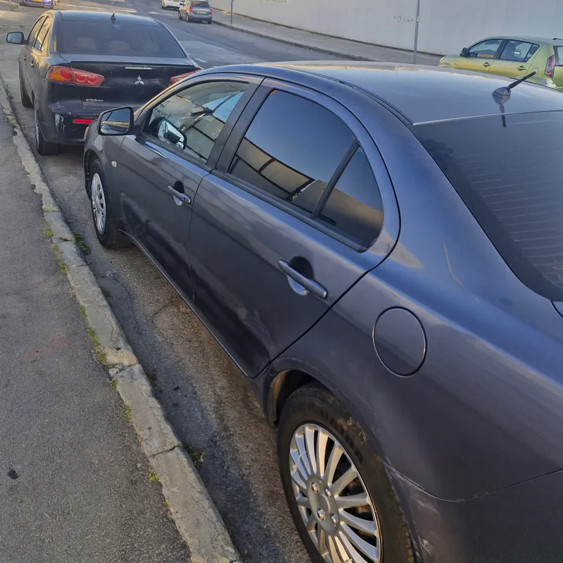 Mitsubishi Lancer с пробегом, 2009, частная рука