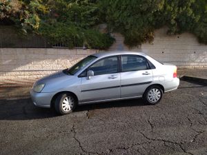 Suzuki Liana pour pièces, pneus, rétroviseurs, amortisseurs, phares, etc.