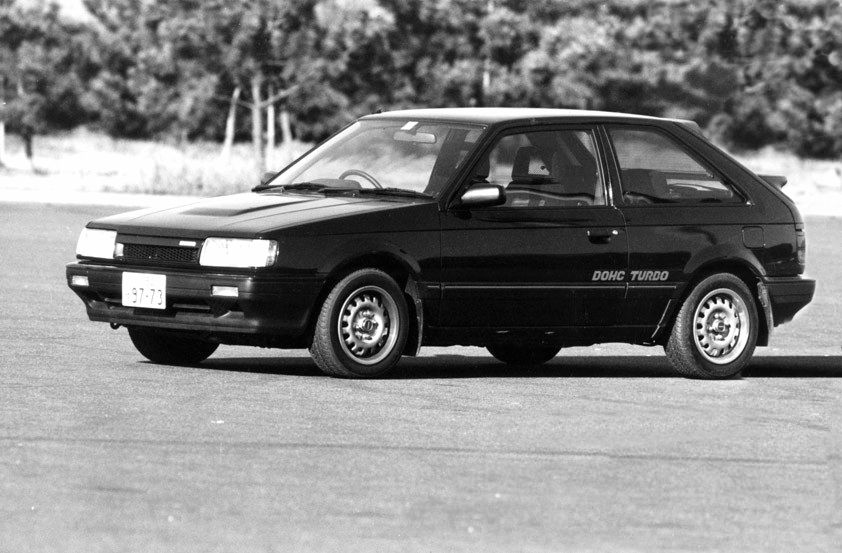Mazda Familia 1989. Carrosserie, extérieur. Hatchback 3-portes, 6 génération