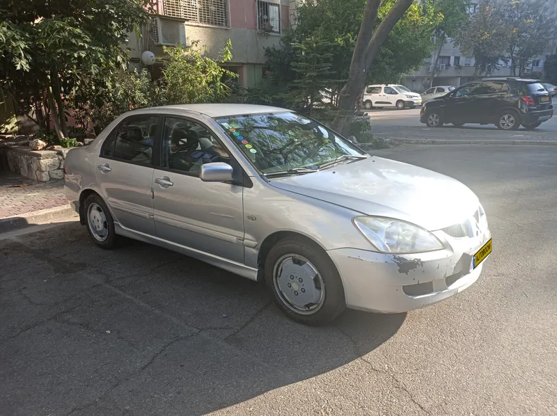 Mitsubishi Lancer с пробегом, 2006, частная рука